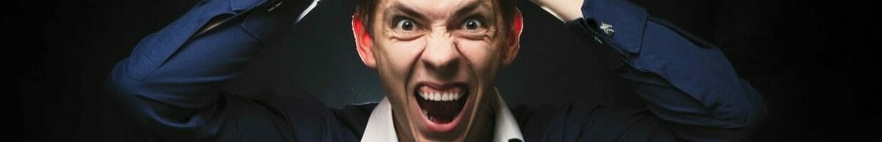 Angry man playing poker