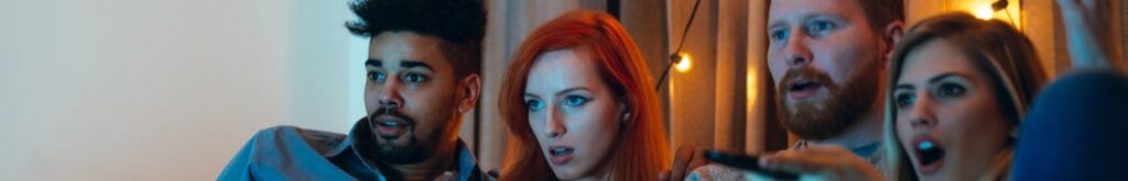 Two couples watching movies.