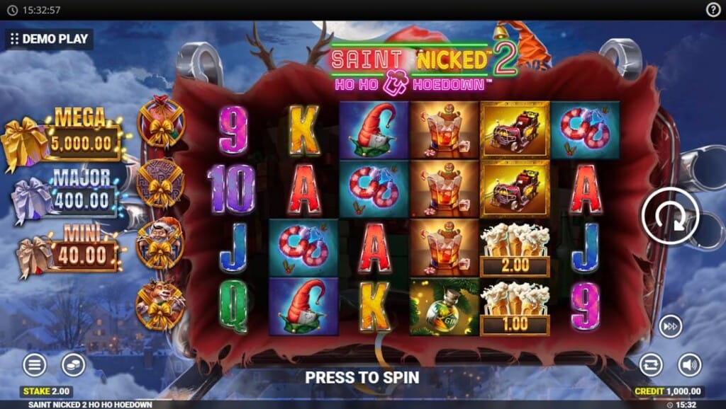 A screenshot of the Saint Nicked 2 slot reels. The background is a cloudy sky high above a town. The back of Santa’s sled is clearly visible. In the foreground, the open bag of gifts on Santa’s sleigh becomes the slot reels. The reels are filled with various Christmas-themed and playing card symbols.