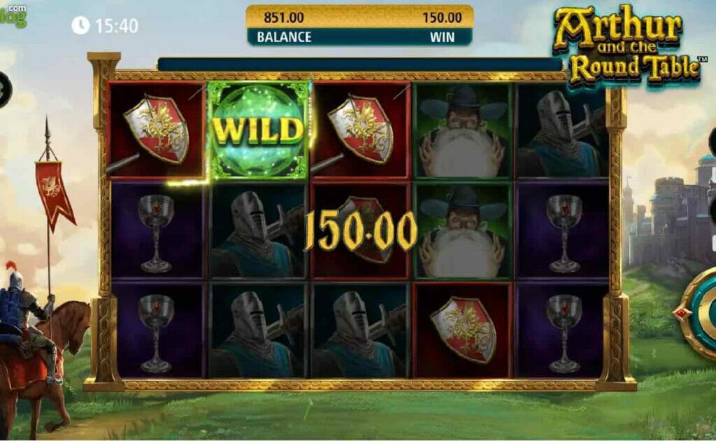 A view of the reels with a castle in the background and a knight on a horse to the left.