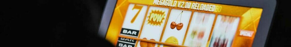 An online slot game on a laptop.