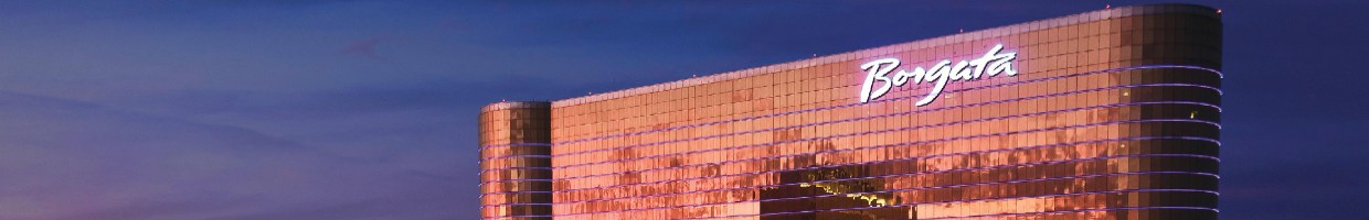 Detail of the Borgata Hotel exterior at dusk.