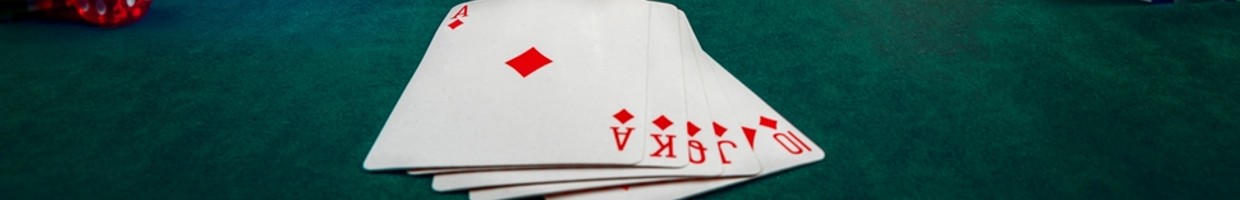 A flush of diamonds on a poker table.