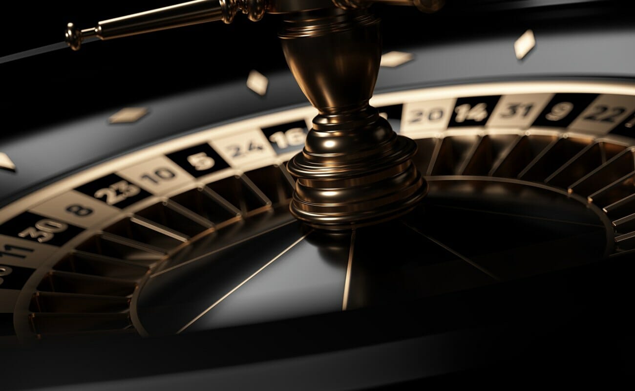A black and gold roulette wheel.