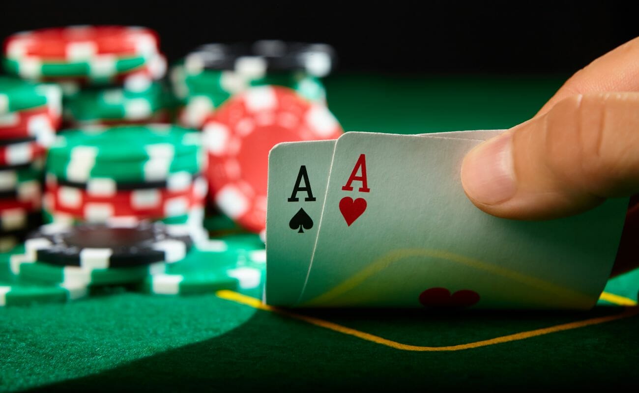 A pair of aces in someone’s hand.