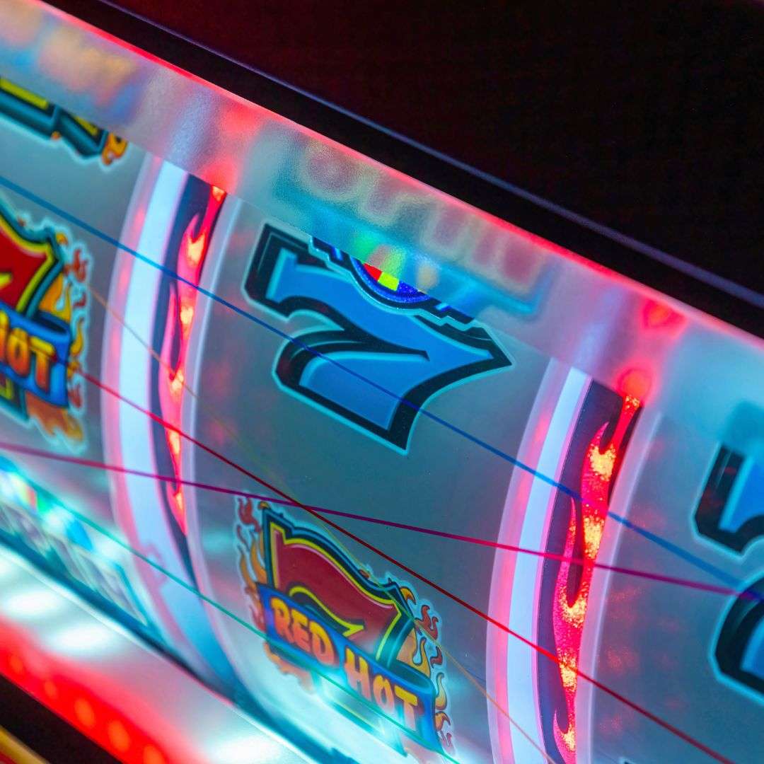 close up of a slot machine lit up in a casino