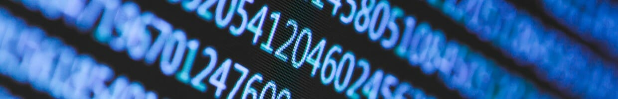 A close-up of a computer screen with random numbers on it.