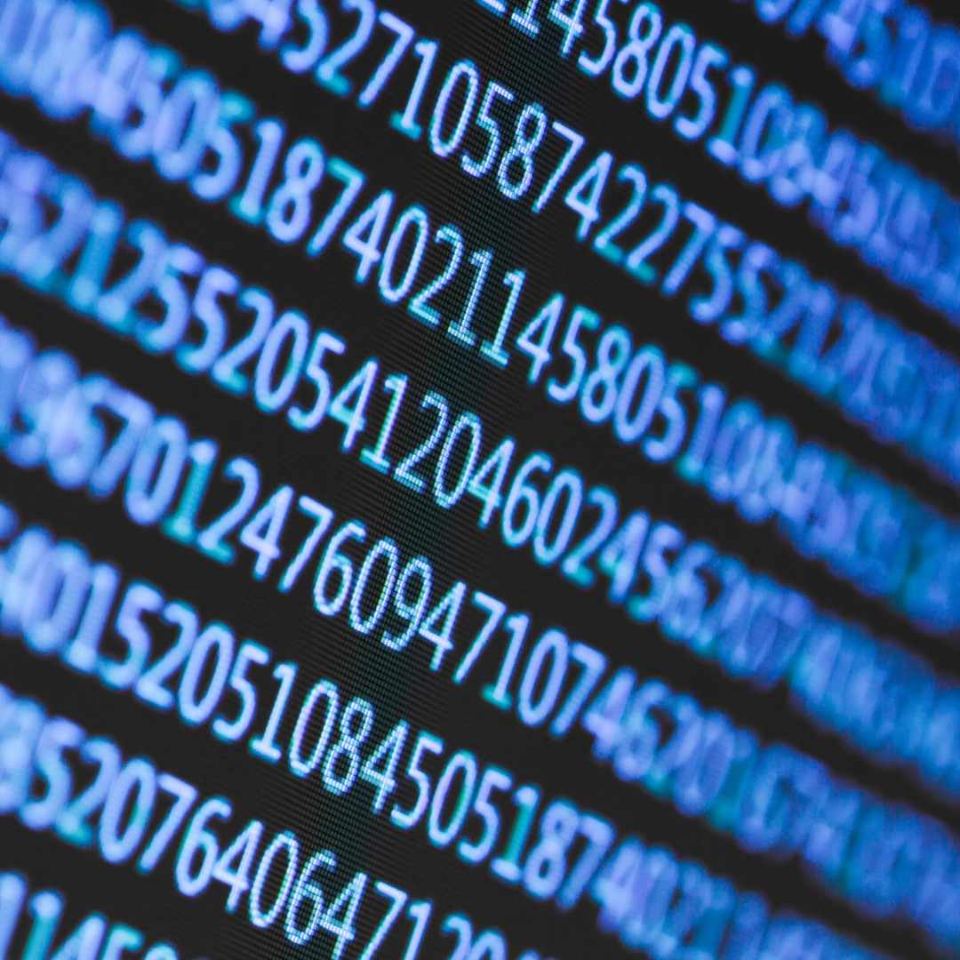 A close-up of a computer screen with random numbers on it.