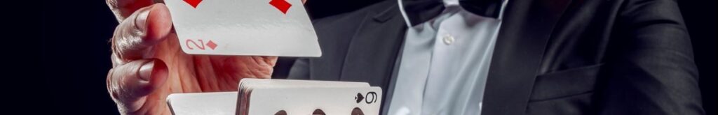 A casino dealer shuffling cards.