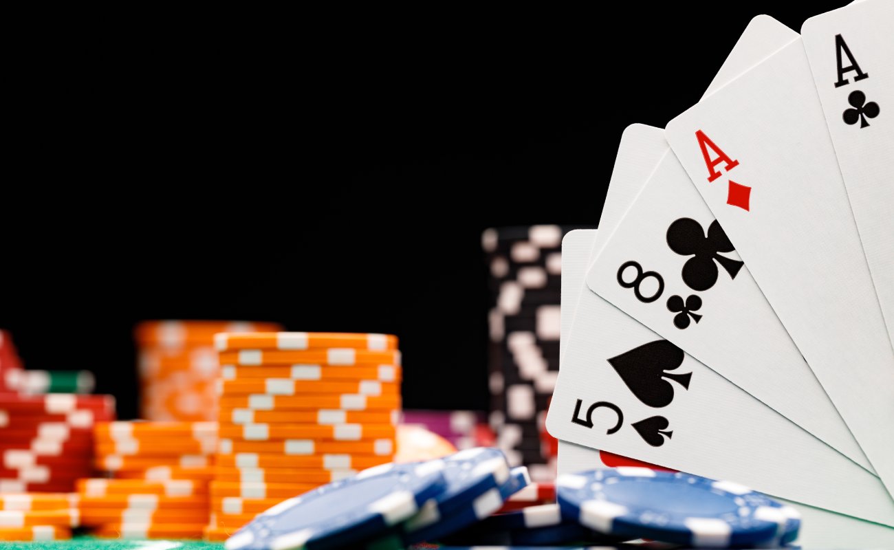 Colorful casino chips and playing cards.