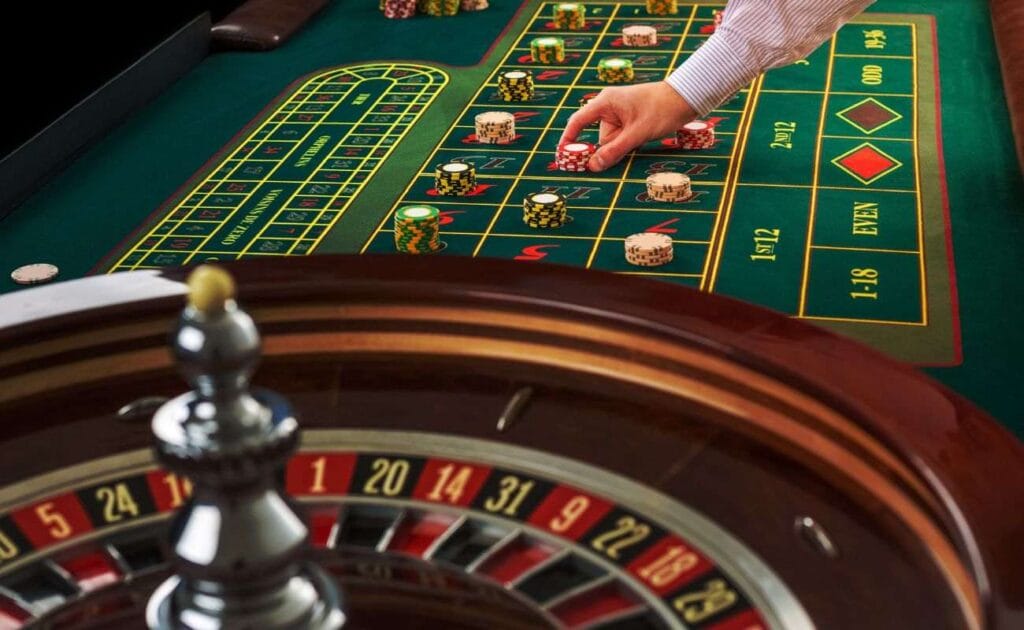 A white ball on the black four, on a roulette wheel.
