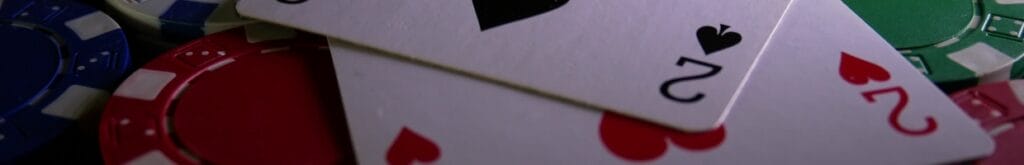 Playing cards and casino chips on a poker table