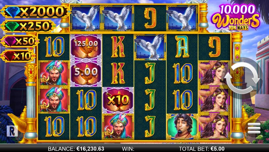A screenshot of the slot reels in 10,000 Wonders 10K Ways. The background is the grounds of a Middle Eastern palace. In the foreground are the slot reels with ornate gold and silver pillars on the side. The reels are filled with various themed symbols, including lamps, doves, viziers, princesses, and Aladdin, as well as regular slot symbols, like 9, 10, J, K, and A. To the left of the reels are the jackpot rewards, and on the right is the game interface.