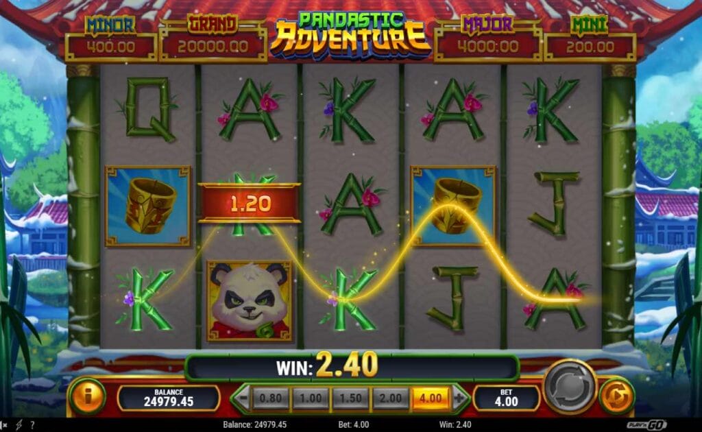 Borgata Exclusive: Pandastic Adventure online slot with a win across the bamboo reels. There are bamboo playing cards (J, K, and A) symbols and a ring symbol on the reels. The background shows a Japanese landscape with snow, houses and trees. The game’s jackpot prizes are situated above the reels.