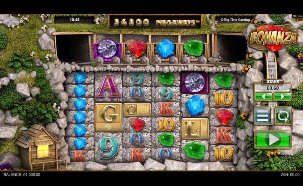 A screenshot of the reels in Bonanza Megaways, set against a quarry with minecarts. The reel symbols include different colored gems and diamonds, as well as A, K, and Q symbols.