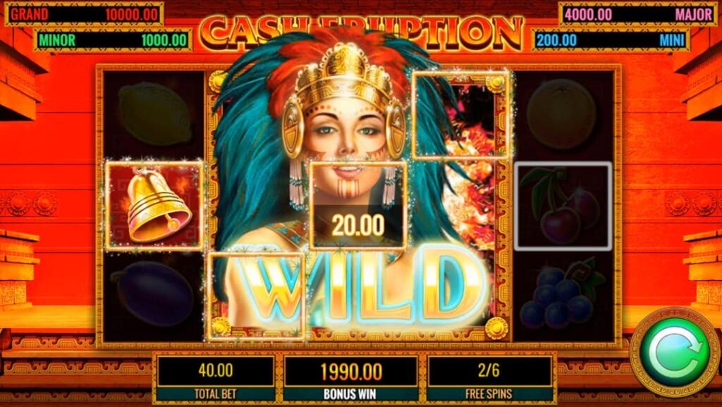 A screenshot of the Cash Eruption slot reels during the Free Spins feature. A super-sized wild symbol is visible on the reels, triggering a win. Above the slot reels in either corner are the jackpot prizes. Below the slot reels is the free spins game interface. The background is the Aztec temple with almost red walls. 