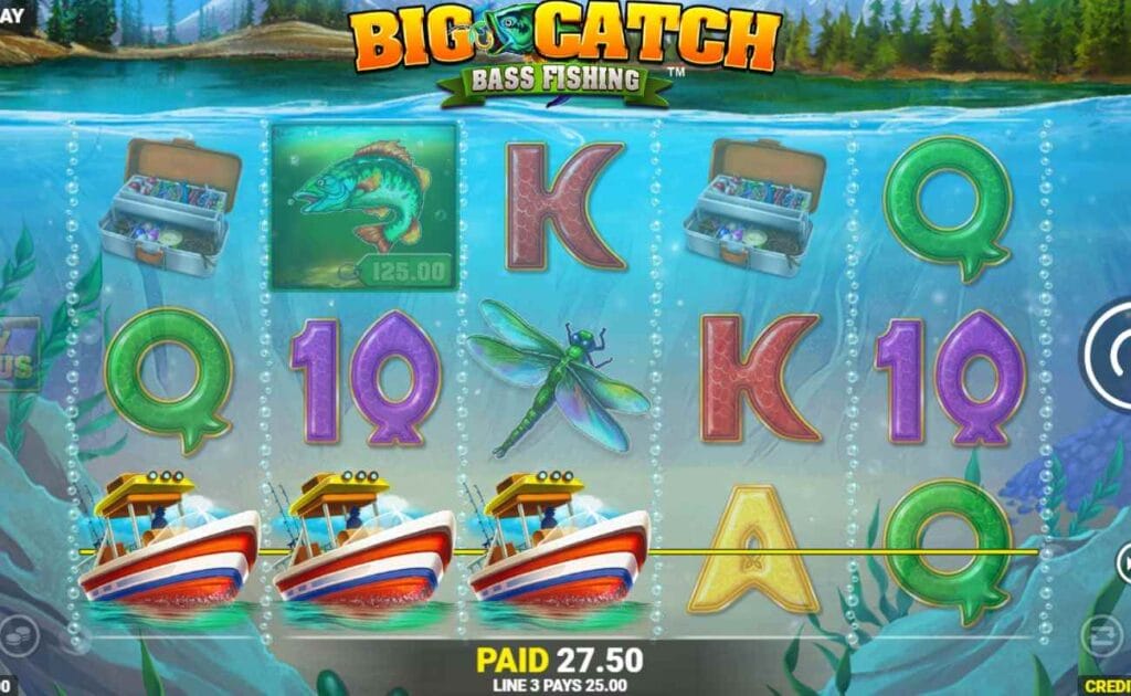 A screenshot of the base gameplay of Big Catch Bass Fishing, featuring various fishing-themed symbols on a 5x3 grid that looks like it is under water. There is a winning combination of fishing boat symbols on the reels. 