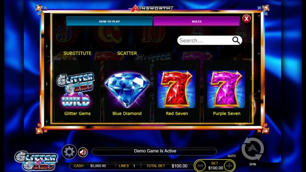 A screenshot of the paytable from the Glitter Gems slot. The paytable is overlaid on the classic deep blue satin-style background. In the center foreground, four brightly lit symbol panels are labeled with yellow text. These are Glitter Gems as the wild, blue diamond as the scatter, and both the red and purple 7s. The game interface is visible below the paytable.