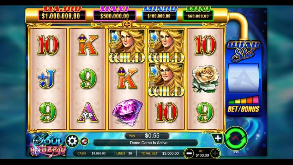 A screenshot of the slot reels in the Soul Queen slot. The game reels show symbols like WILDs, gems, and royals, with jackpot tiers and bet and spin controls displayed.