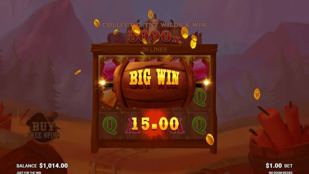 A screenshot of the slot reels in Big Boom Riches. The words BIG WIN and a payout of 15.00 are visible in front of the slot reels. The reels and background are slightly faded out relative to the payout notification.