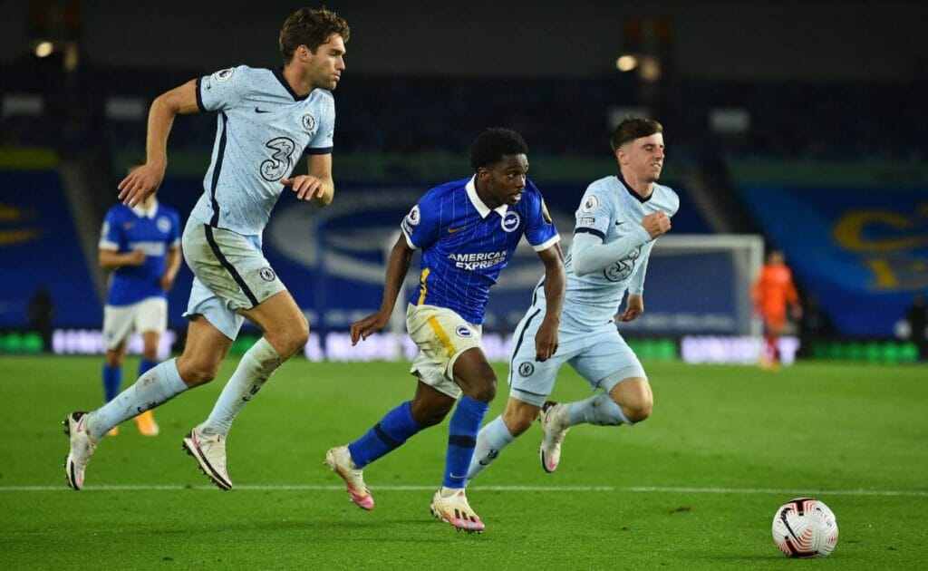 Tariq Lamptey beats Chelsea's defender Marcos Alonso and midfielder Mason Mount during the EPL football match in September 2020.