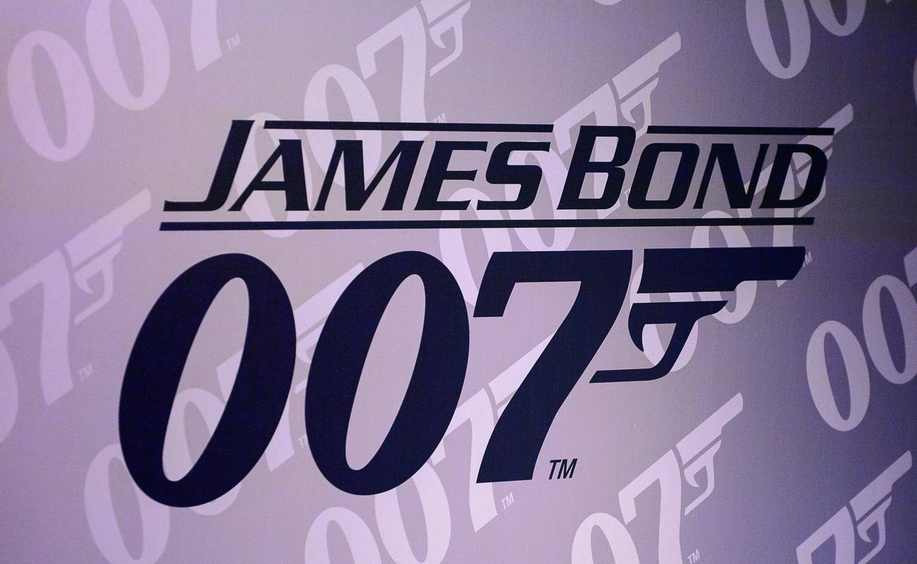 James Bond 007 logo in front of a purple background