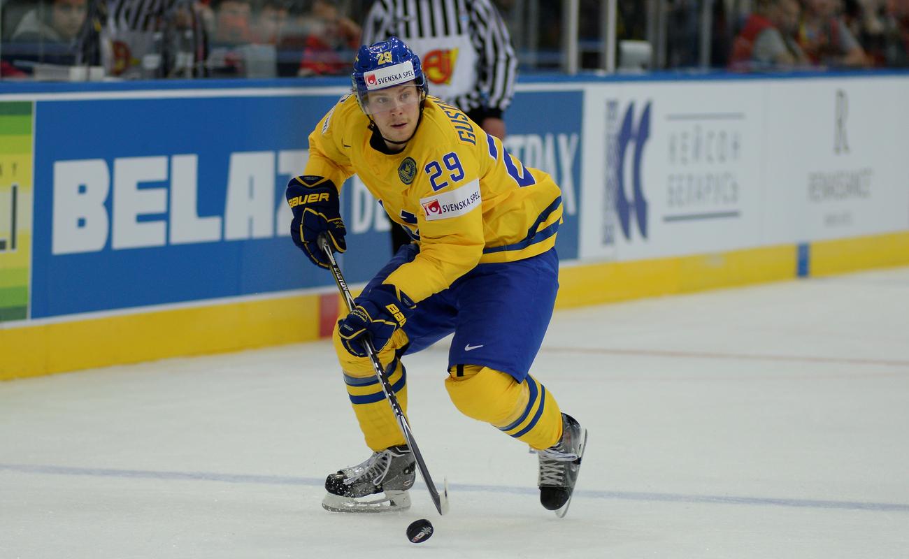 Erik Gustafsson dribbling the puck in a game