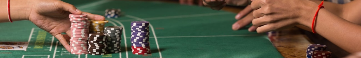 Player winning chip with betting baccarat with banker hand