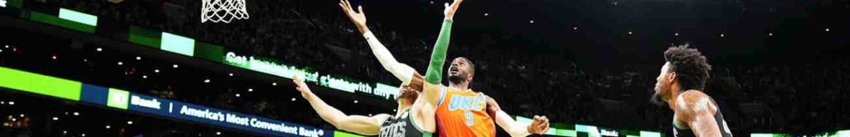 OKC vs Celtics basketball match with players jumping for the ball