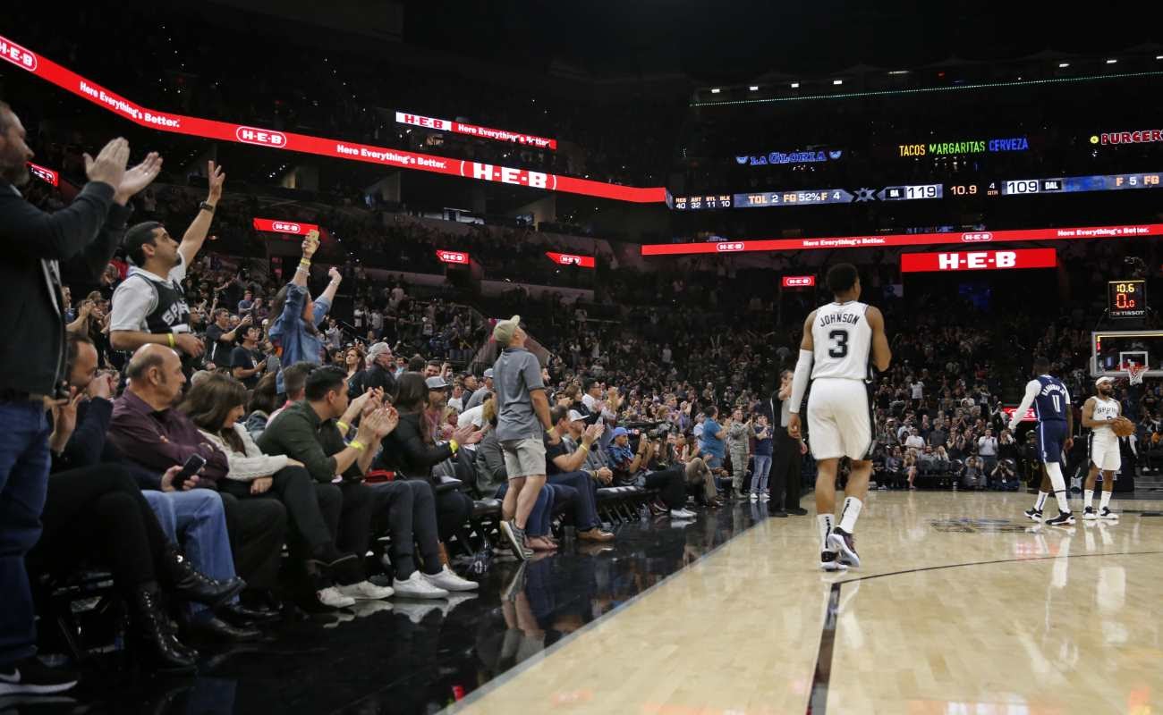 NBA match with fans applauding players
