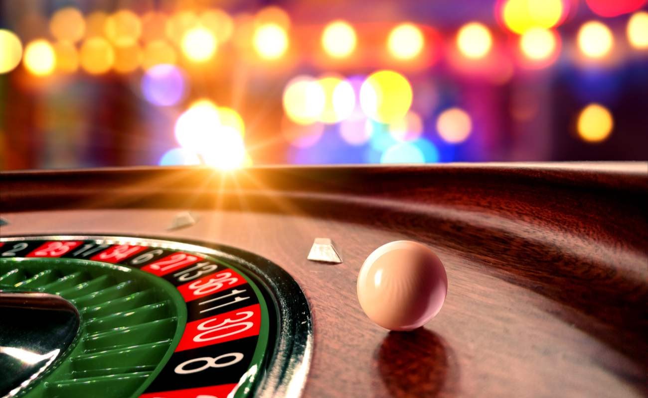 A roulette wheel with a white ball.