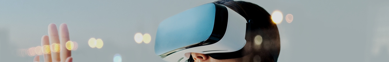 Woman wears virtual reality glasses.