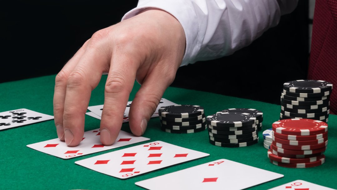 poker-dealer-and-cards.jpg