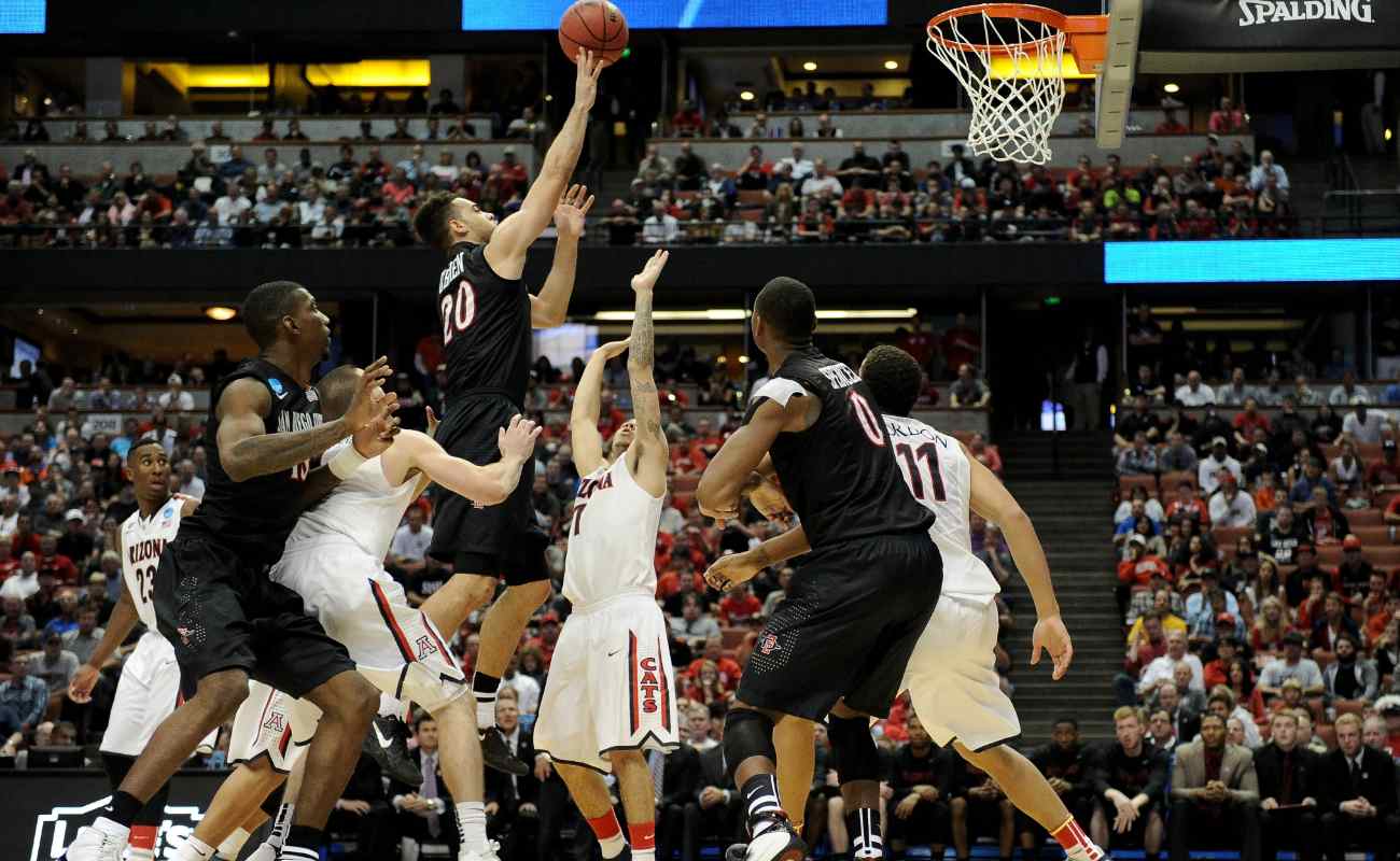 O'Brien of San Diego State Aztecs shoots over Gabe York of Arizona Wildcats in regional semifinal of 2014 NCAA Men's Basketball Tournament
