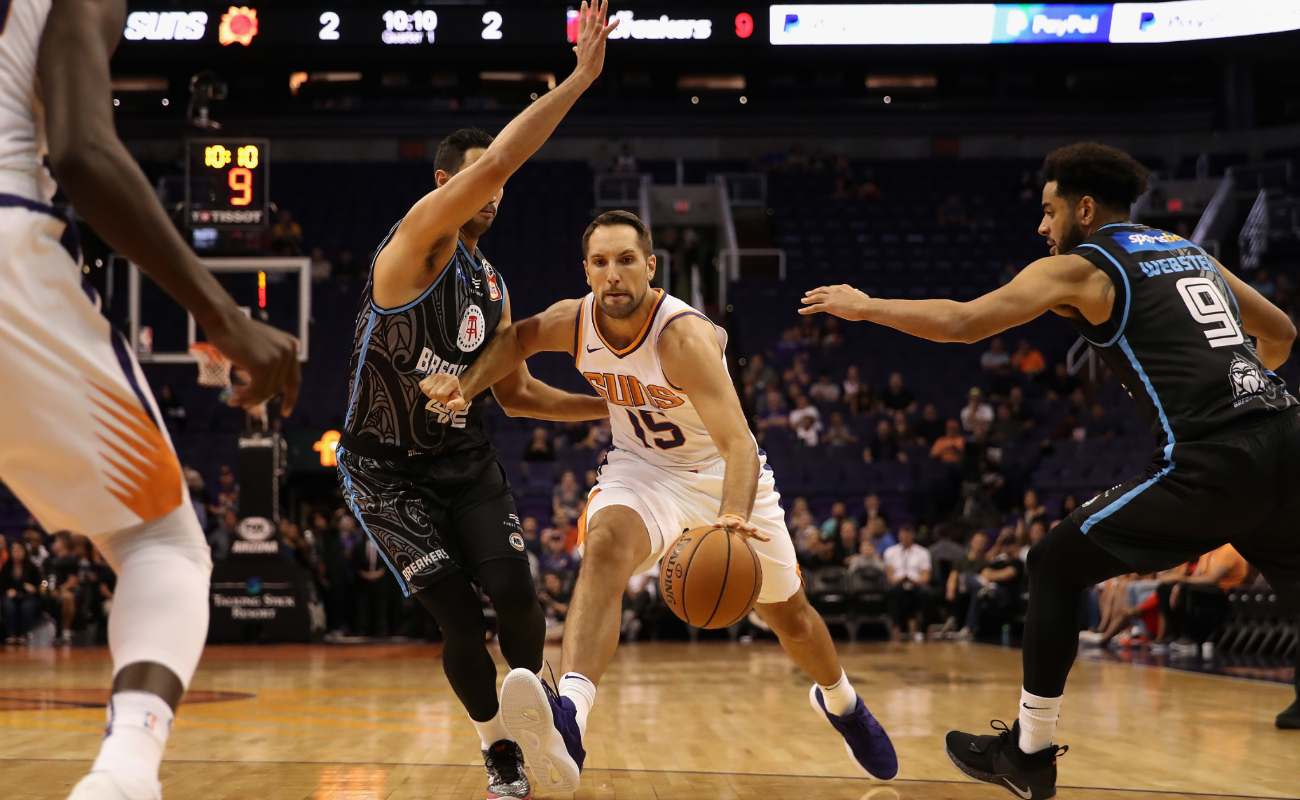 Ryan Anderson of Phoenix Suns handles the ball at NBA game at Talking Stick Resort Arena