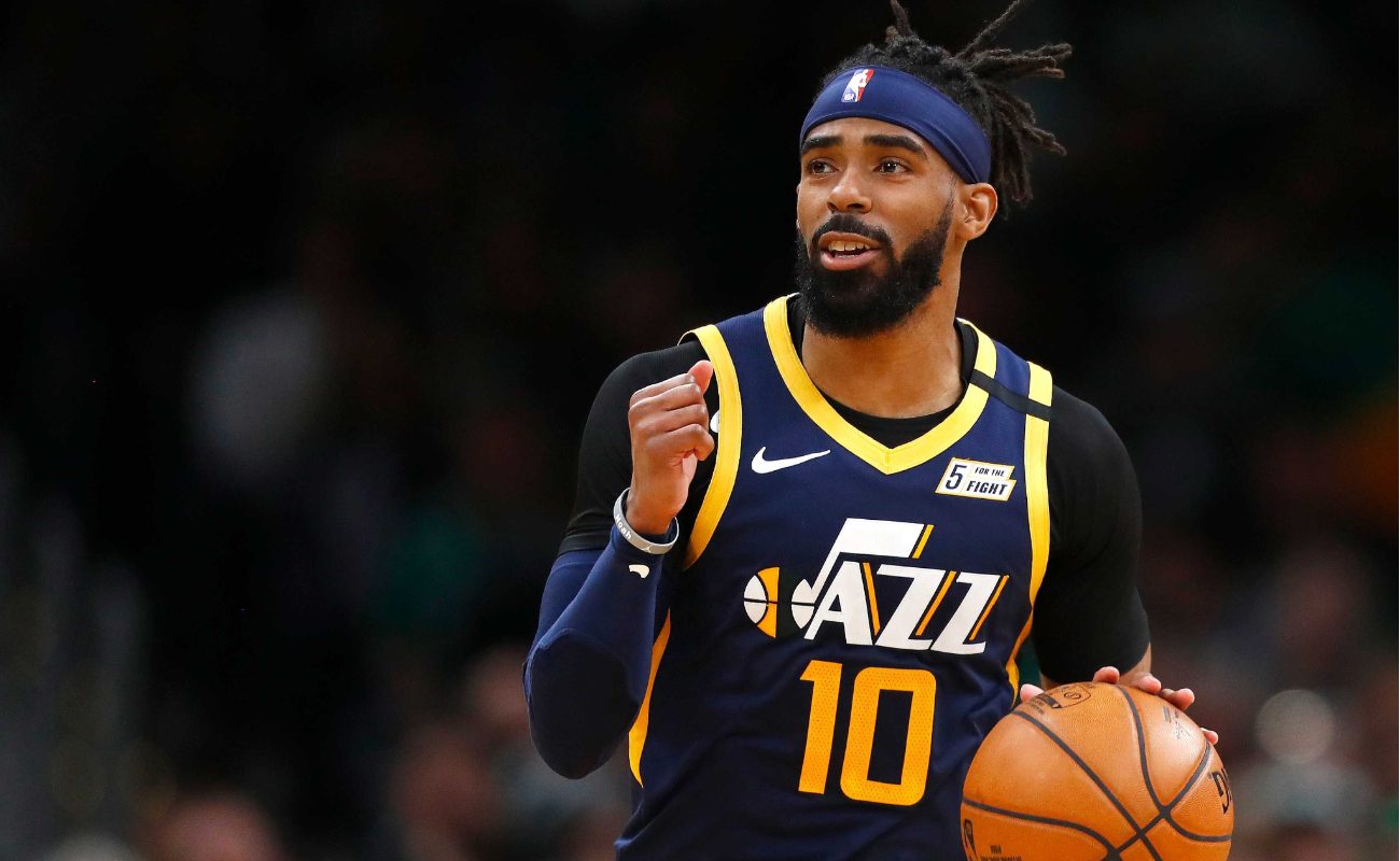 Mike Conley of Utah Jazz brings basketball up court during game against the Boston Celtics at TD Garden