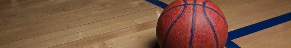 Basketball on empty court