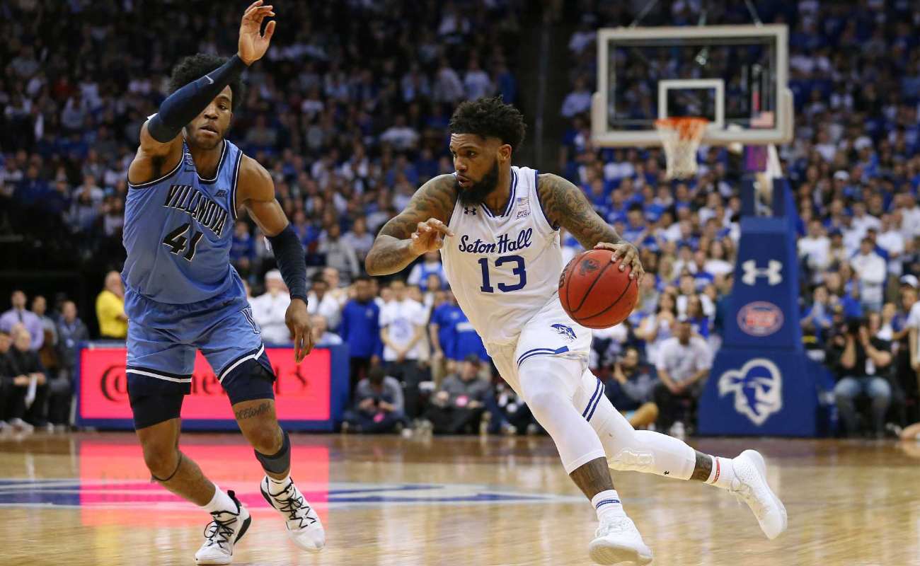 Myles Powell of Seton Hall Pirates in action against Saddiq Bey of Villanova Wildcats during college basketball game