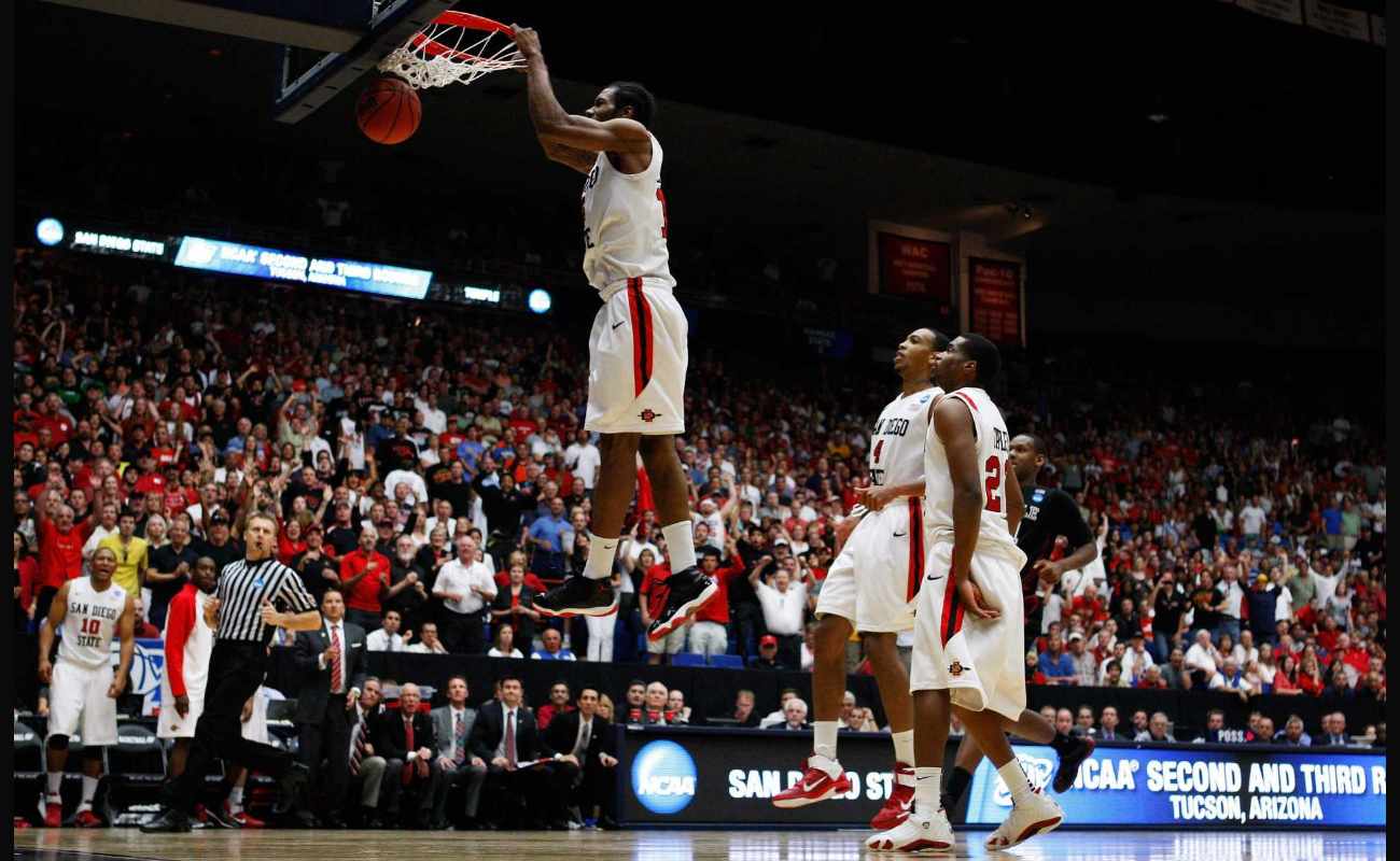 Kawhi Leonard #15 of the San Diego State Aztecs scores the final basket against the Temple Owls at 2011 NCAA men's basketball tournament
