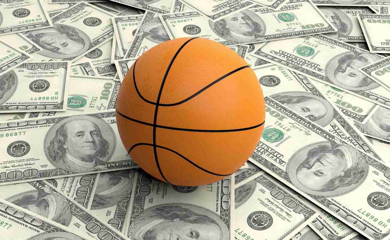 Basketball on top of banknotes.