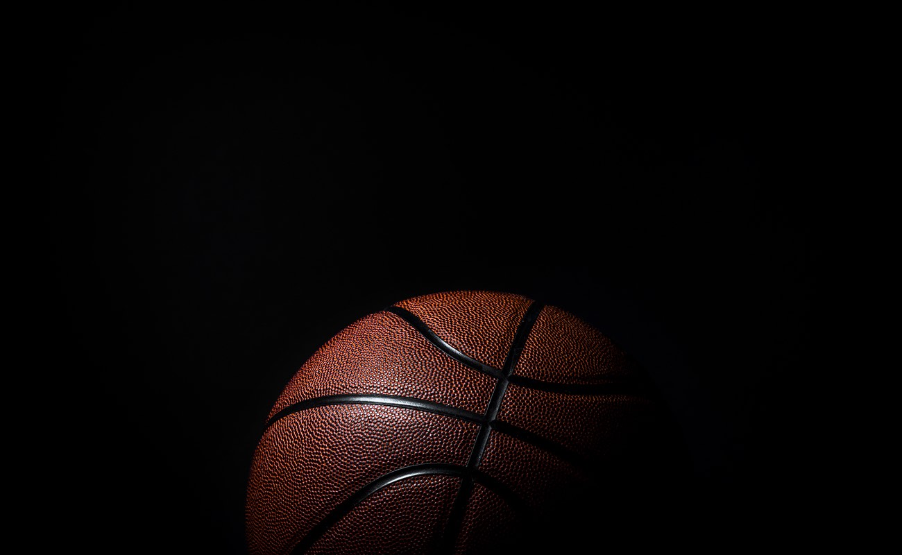 Closeup detail of basketball ball texture background