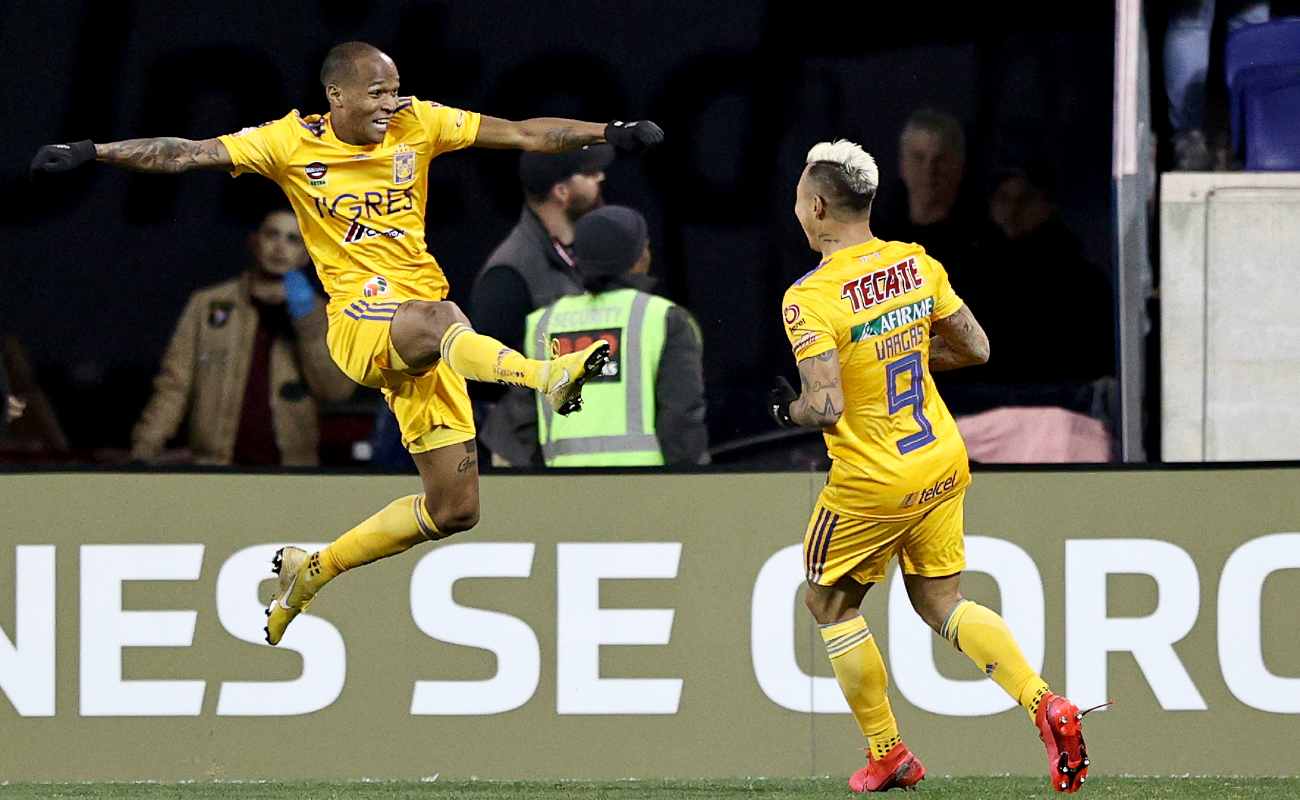 Eduardo Vargas of UANL Tigres celebrates his goal with teammate Luis Quinones against the New York City FC