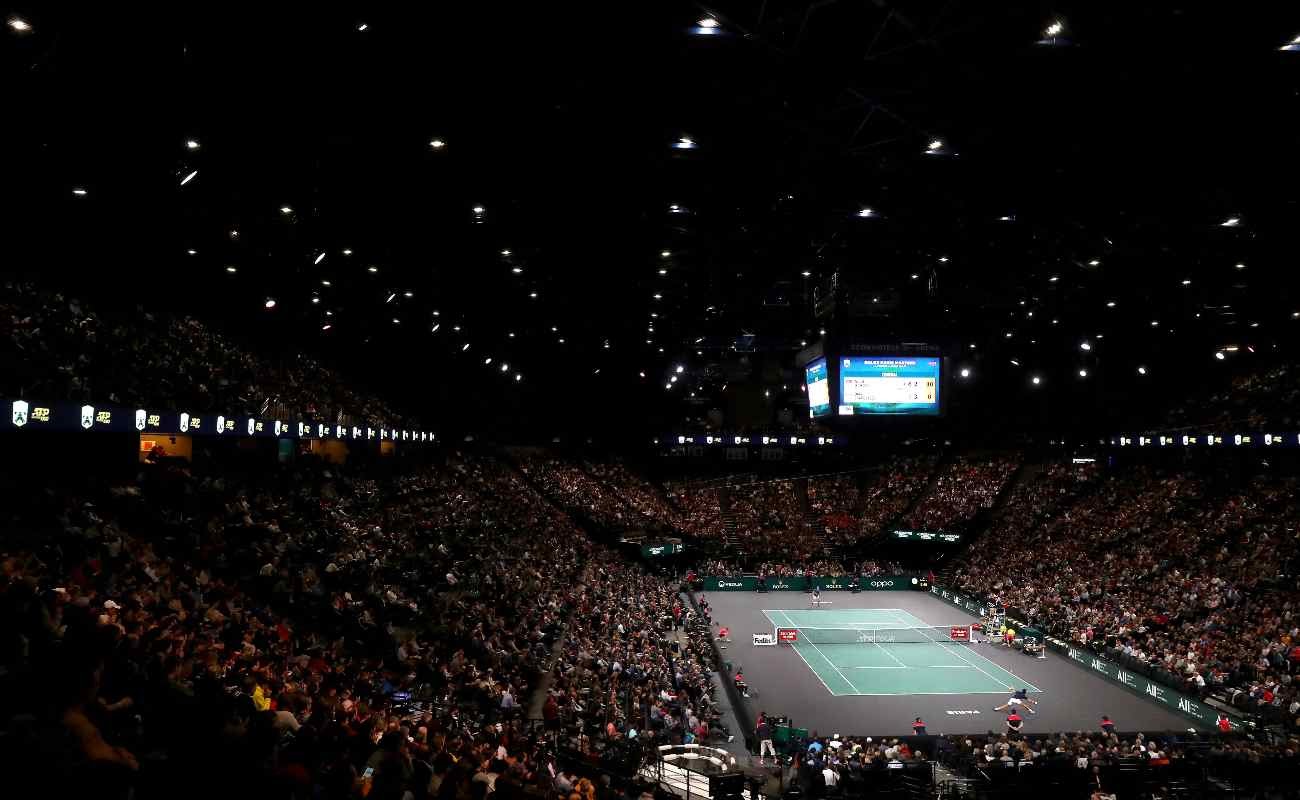 A view from the top stands of Novak Djokavic playing tennis against Denis Shapovalov in the Rolex Paris Masters