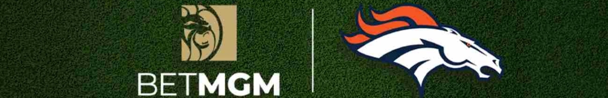 Football field with the Broncos logo and BetMGM on either side of the halfway line.