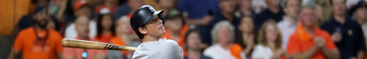 DJ LeMahieu of the New York Yankees watches the ball fly as he hits a home run
