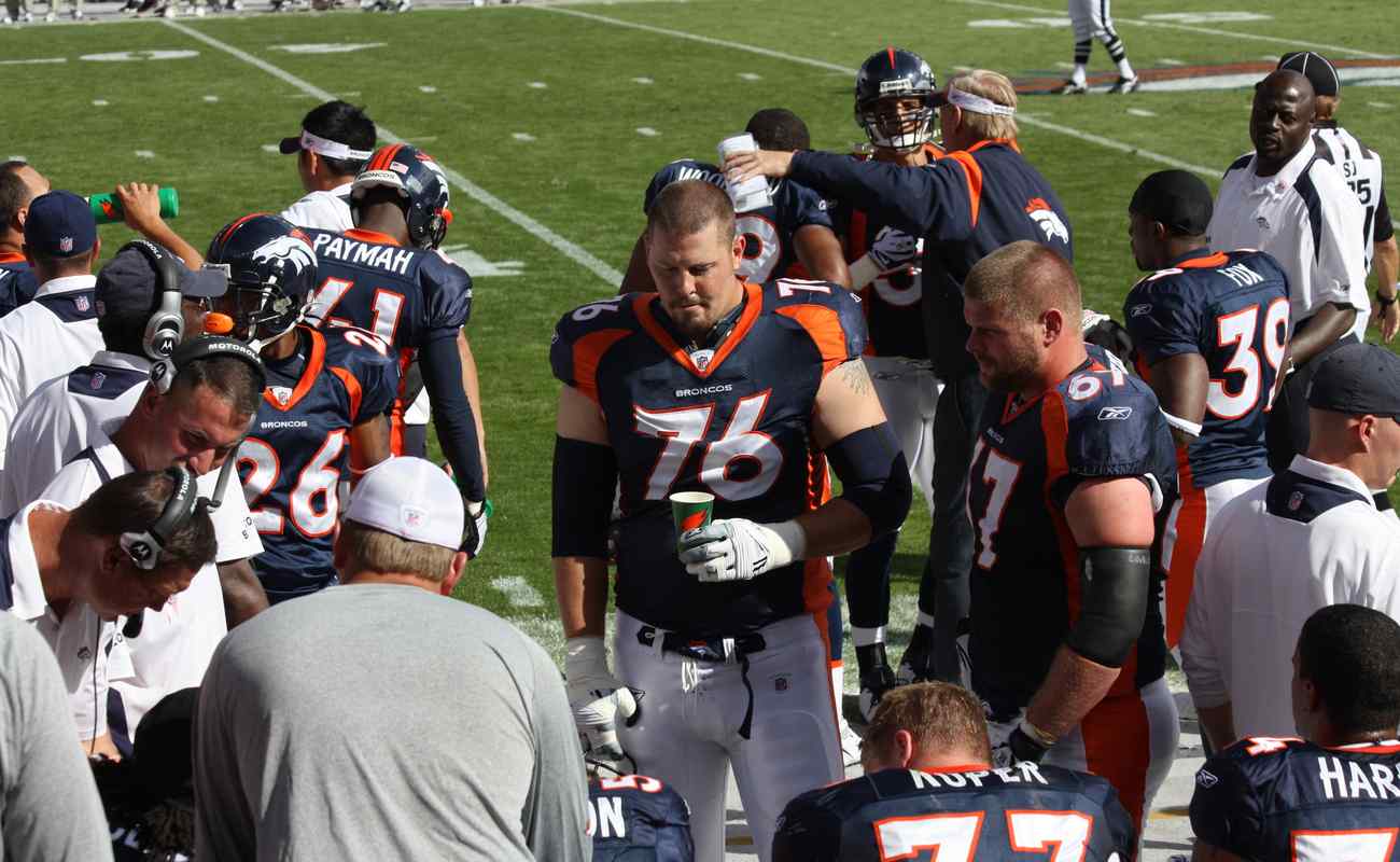 Denver Broncos players and technical team at training camp