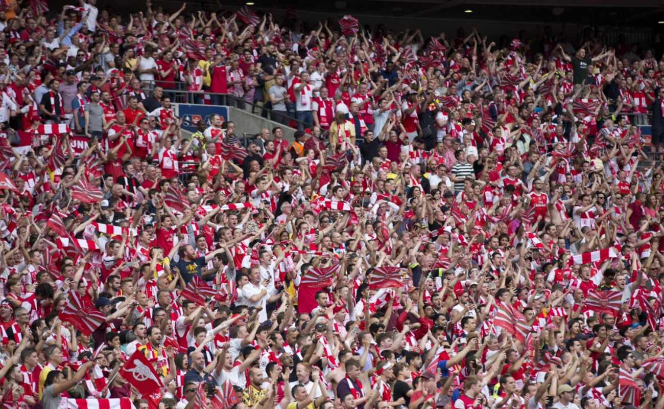 Arsenal fans celebrate their victory against Chelsea FC in the FA Cup final at Wembley Stadium on May 27, 2017