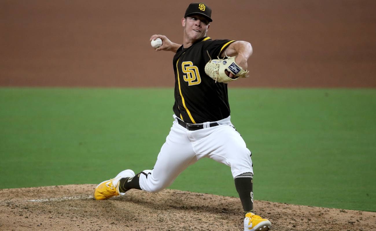 Emilio Pagan #14 of the San Diego Padres pitches during the 6th inning of a an exhibition game against the Los Angeles Angels