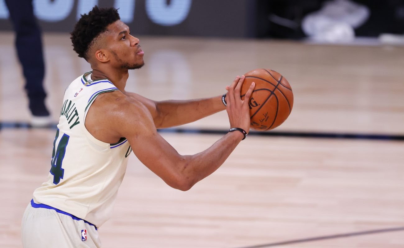 Giannis Antetokounmpo of Milwaukee Bucks shoots a free throw at The Arena at ESPN Wide World Of Sports Complex in August 2020