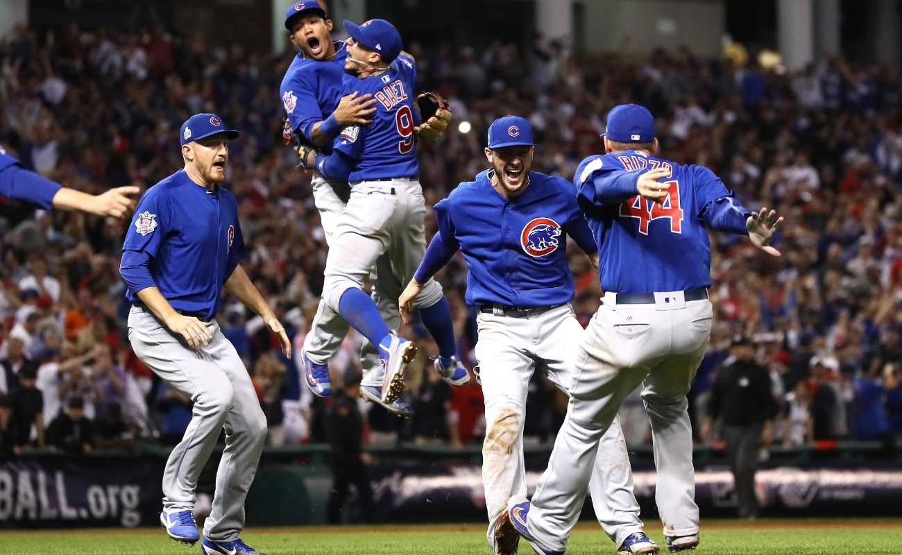 Chicago Cubs team celebrates on the field.